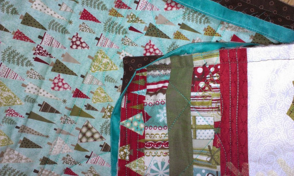 Ricky Tims piped binding on my Table Runner - corners
