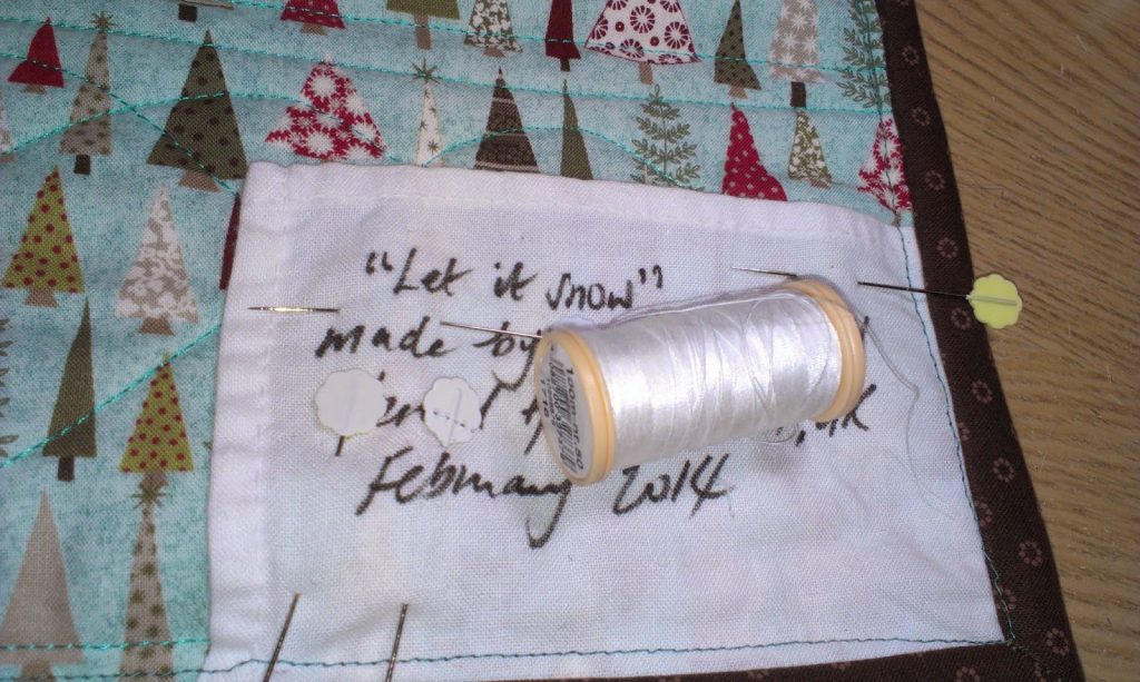 vintage finds - old napkin as a label on a table runner
