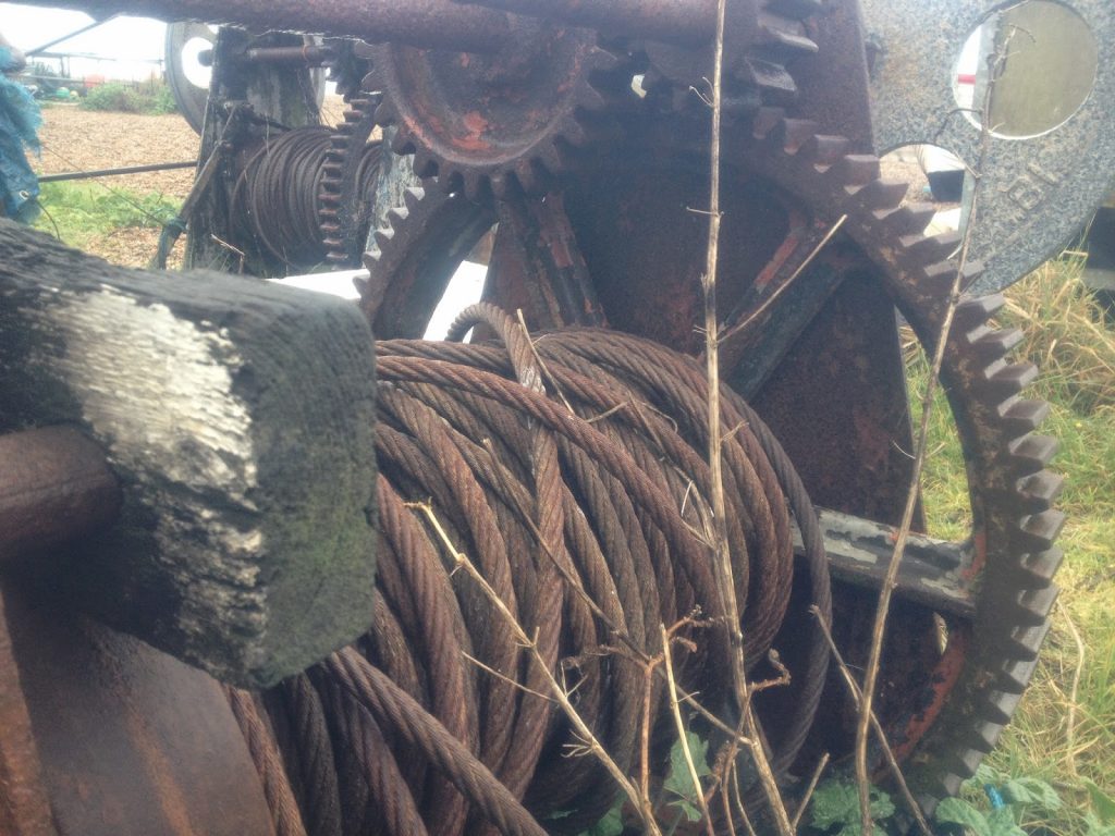 Rust on the beach - metal cable