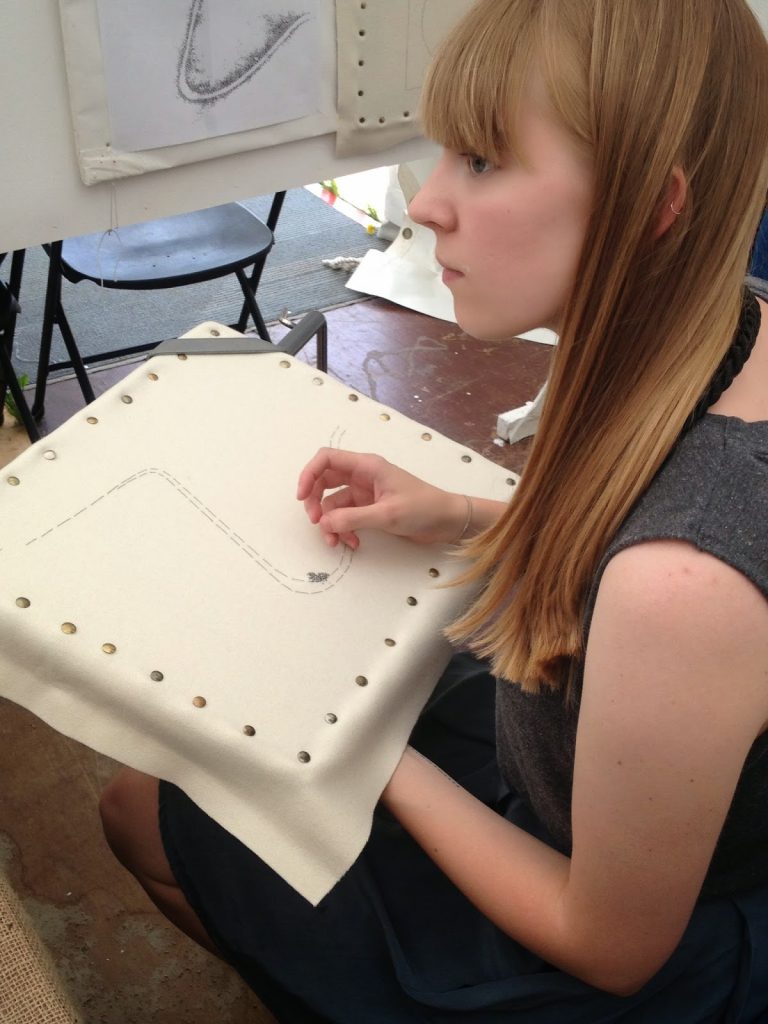 Hand stitched work by Roanna Wells