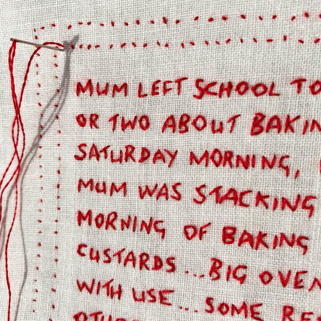 The final stitch in a red and white embroidery called The Sound of the Kenwood Chef