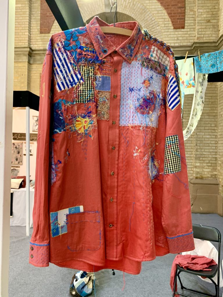 Hand embroidered garment by Alex