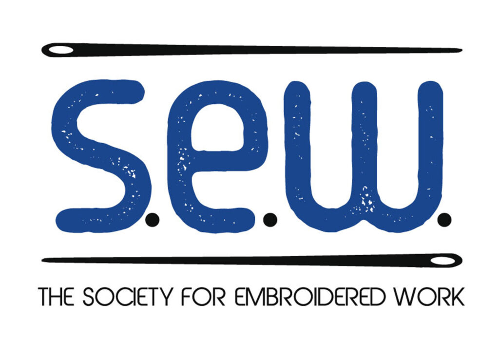 Logo featuring the letters S.E.W between two needles.