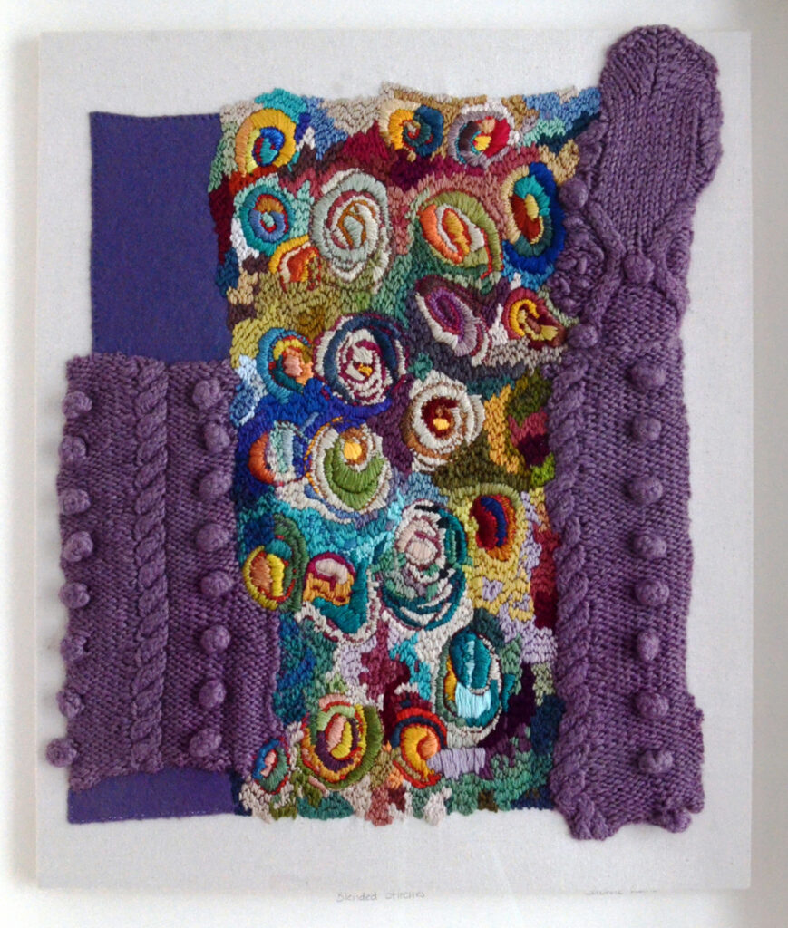 Blended Stitches. image showing parts of a purple jumper and embroidery - textile art created from old jumpers.