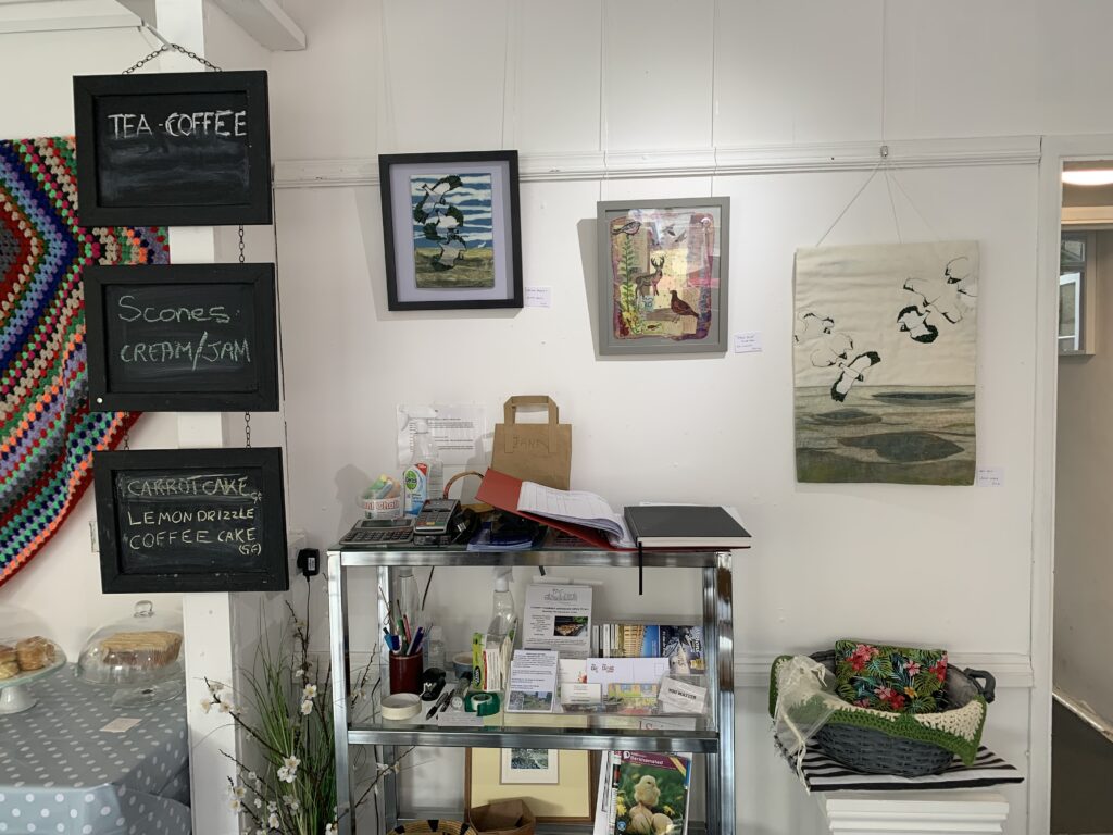 A collection of artwork on exhibition from textile artists