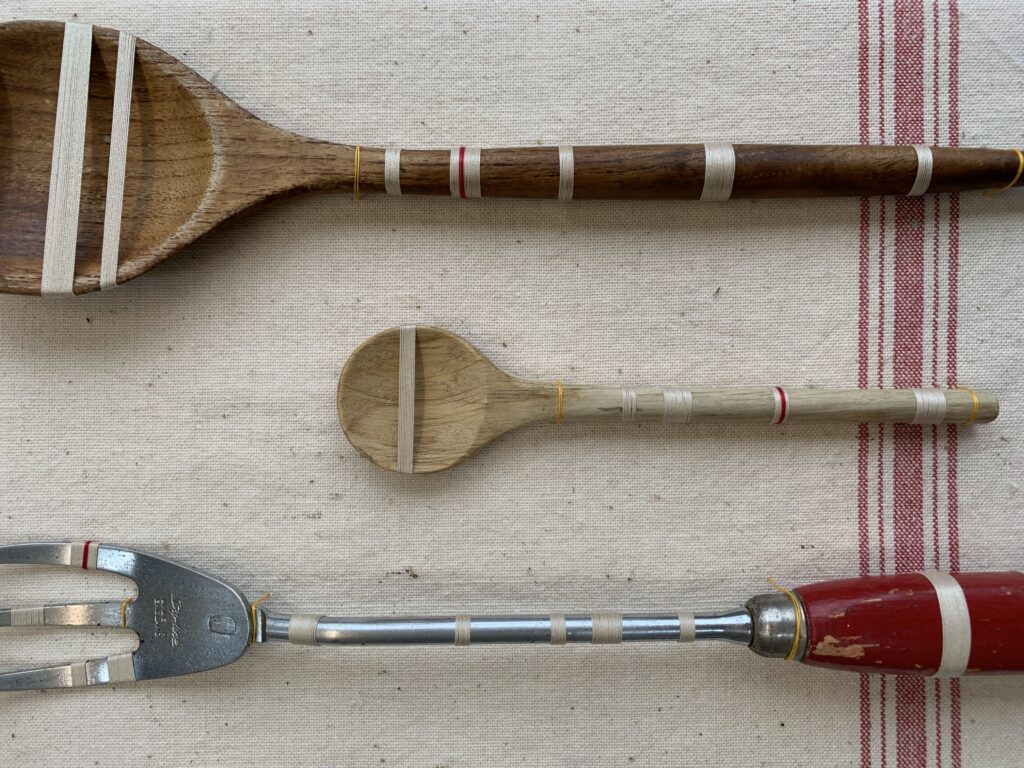 Bound part 1 - vintage kitchen utensils wrapped in vintage cream cloured thread and red sylko thread
