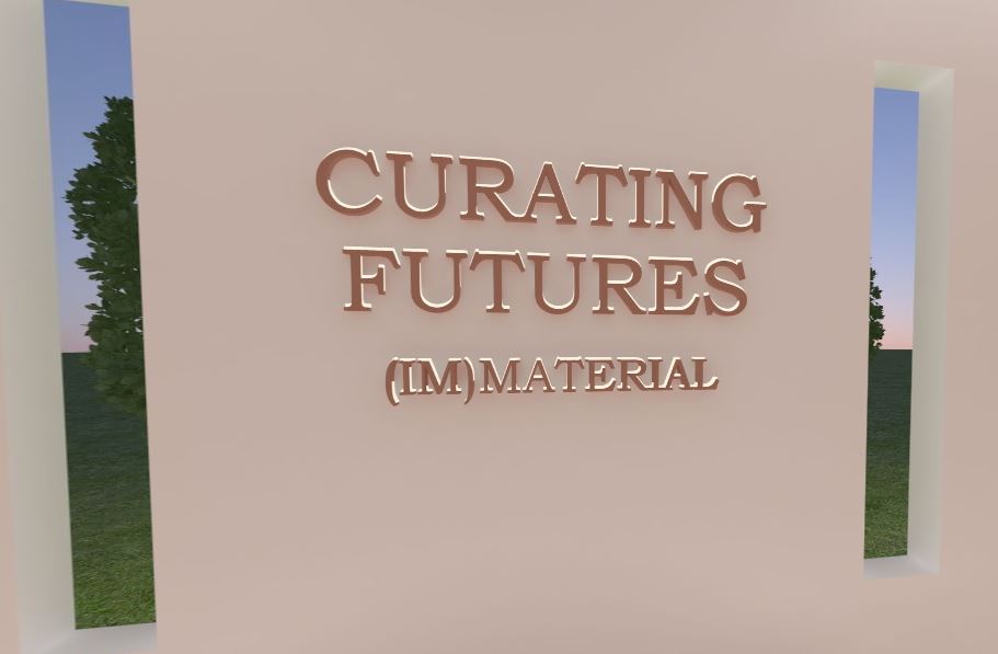 words - curating futures IMMaterial Exhibition- on a gallery wall in brown and gold