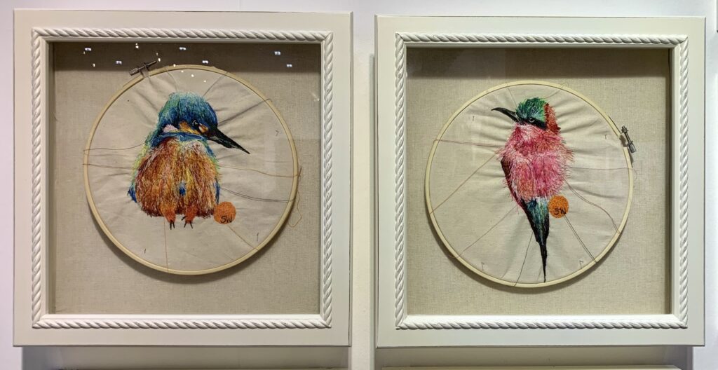 Machine embroidered birds