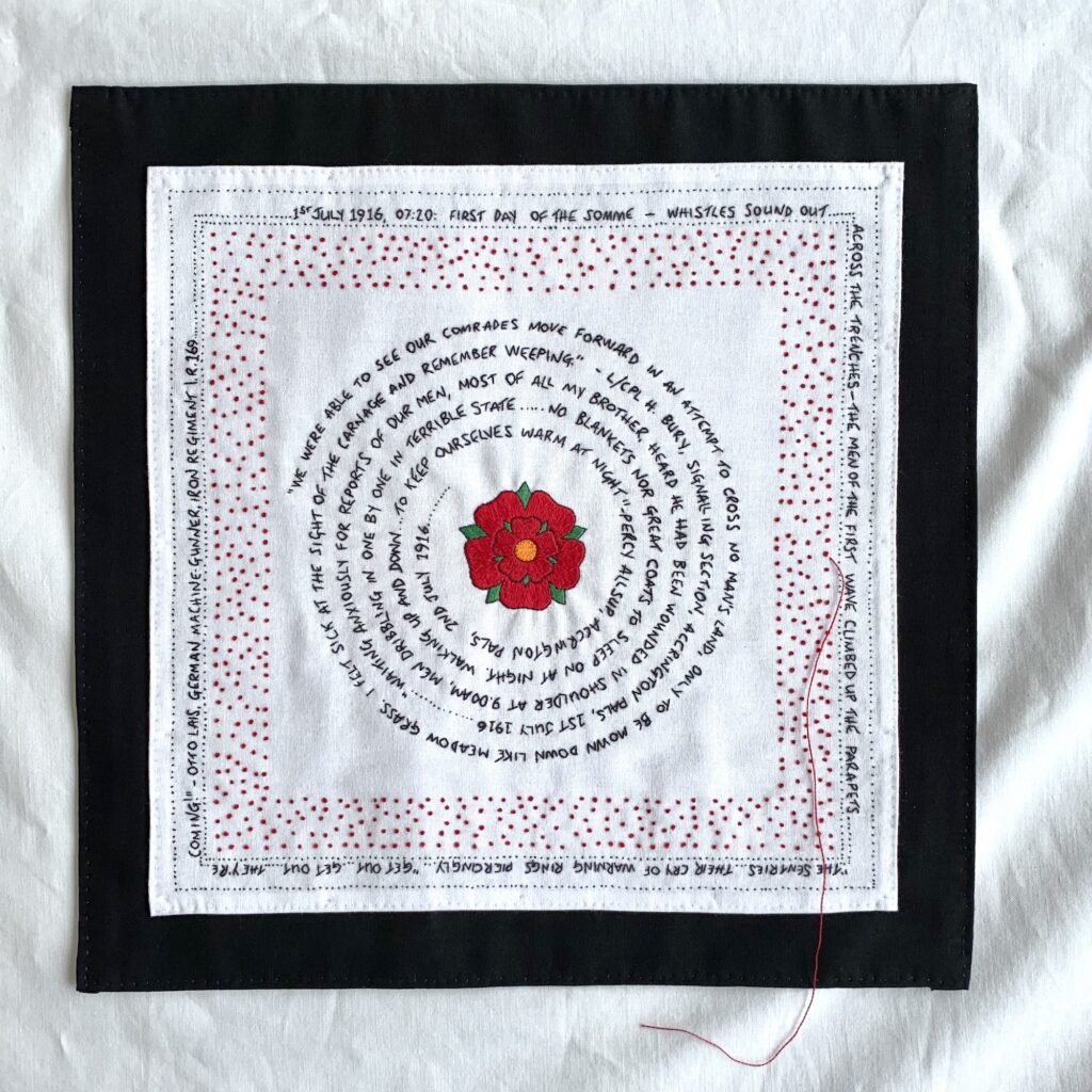 Accrington Pals, hand embroidered textile art. French know, hand embroidered tex and lancashire rose. Part of the One Red Thread 'Kindred Spirits' exhibition, Australia