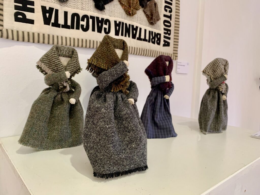 Lancashire cotton mill workers wrapped in tweed shawls 